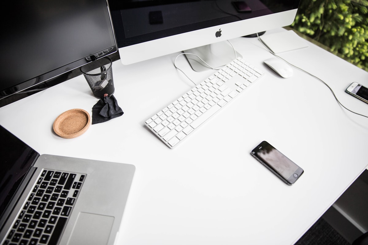 A clean, modern desk setup — the everyday technology we help small businesses get working